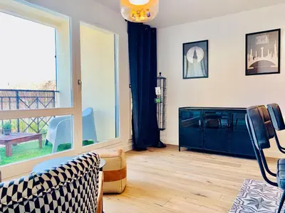 Coin salon dans l'établissement Les Trois B - Hypercentre de Beaune