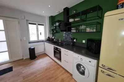 Cuisine ou kitchenette dans l'établissement La Paulée à Pommard