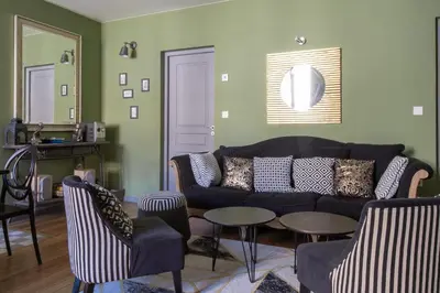 Coin salon dans l'établissement La Chouette des Ducs, Appartement en Hypercentre