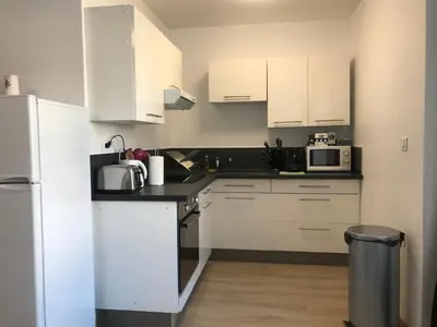 Cuisine ou kitchenette dans l'établissement Appartement centre ville
