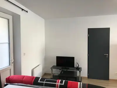 Télévision ou salle de divertissement dans l'établissement Appartement centre ville