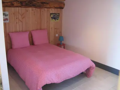 Un ou plusieurs lits dans un hébergement de l'établissement Chambre d'hôtes Chez Karine et Roland