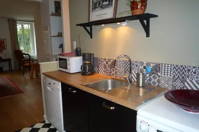 Cuisine ou kitchenette dans l'établissement Le Clos 25