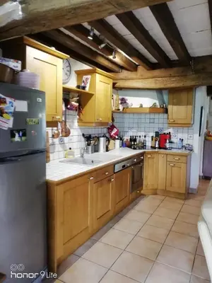 Cuisine ou kitchenette dans l'établissement maison entiere le Lavoir