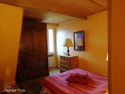 Un ou plusieurs lits dans un hébergement de l'établissement maison entiere le Lavoir