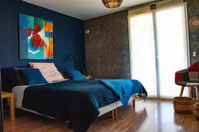 Un ou plusieurs lits dans un hébergement de l'établissement Maison d'hôtes à la Ferme Une Pause à la Guette