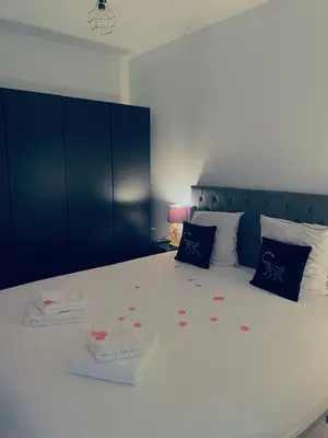 Un ou plusieurs lits dans un hébergement de l'établissement Suite Darcy & Spa