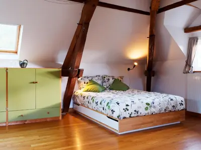 Un ou plusieurs lits dans un hébergement de l'établissement Les Vergers de Cussy