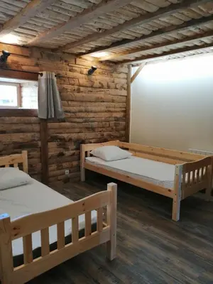 Un ou plusieurs lits dans un hébergement de l'établissement Gîte Les Hauts de Morey - Aux Bonnes-Mares