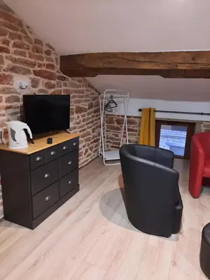 Télévision ou salle de divertissement dans l'établissement Mill D'Arx