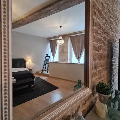 Un ou plusieurs lits dans un hébergement de l'établissement La Dolce Vita Spa privatif