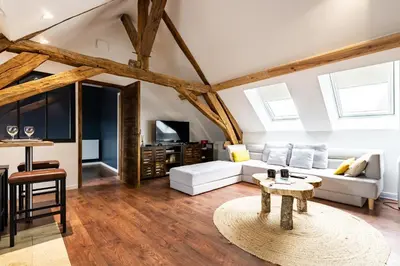 Coin salon dans l'établissement SOUS LE HAUT DES REMPARTS