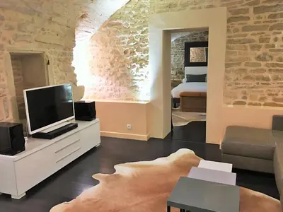 Télévision ou salle de divertissement dans l'établissement Appartement La Borde