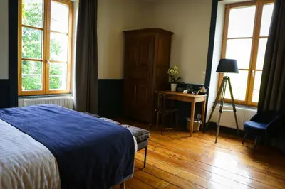 Un ou plusieurs lits dans un hébergement de l'établissement Arc en Sel Maison d’hôtes
