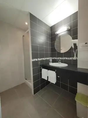 Salle de bains dans l'établissement La Croix Blanche