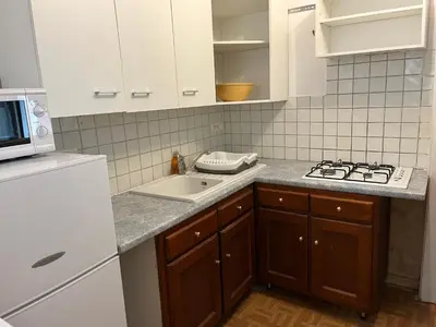 Cuisine ou kitchenette dans l'établissement La Croix Blanche
