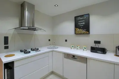 Cuisine ou kitchenette dans l'établissement La Terrasse