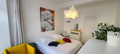 Un ou plusieurs lits dans un hébergement de l'établissement Chambre de charme à Saulieu