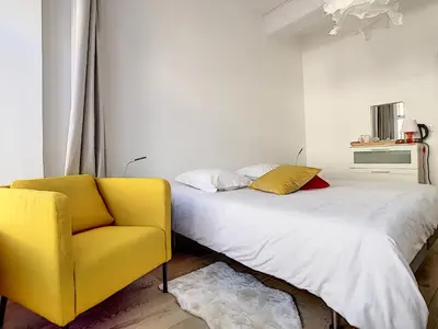 Un ou plusieurs lits dans un hébergement de l'établissement Chambre de charme à Saulieu