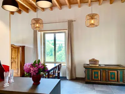 Coin salon dans l'établissement Maison du Cocher