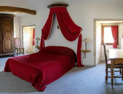 Un ou plusieurs lits dans un hébergement de l'établissement La Maison Royale