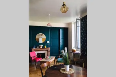 Coin salon dans l'établissement Chez Angèle Centre Mâcon appartement chaleureux