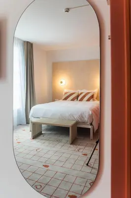 Un ou plusieurs lits dans un hébergement de l'établissement Hôtel-Spa Ô Rouge - Gevrey-Chambertin - Teritoria