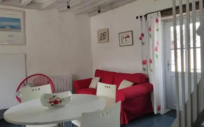 Coin salon dans l'établissement La maisonette du bateau lavoir