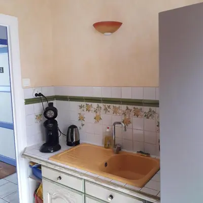 Cuisine ou kitchenette dans l'établissement Petite chambre meublée au cœur de ville - chez l'habitant
