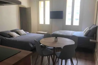 Un ou plusieurs lits dans un hébergement de l'établissement BeauneAppart - Centre- Climatisation - Parking gratuit