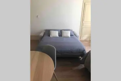 Un ou plusieurs lits dans un hébergement de l'établissement BeauneAppart - Centre- Climatisation - Parking gratuit