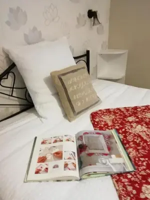 Un ou plusieurs lits dans un hébergement de l'établissement Gite meublé et Chambre d'hôtes LE PUITS DARCY