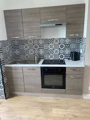 Cuisine ou kitchenette dans l'établissement L’appartement de Rose