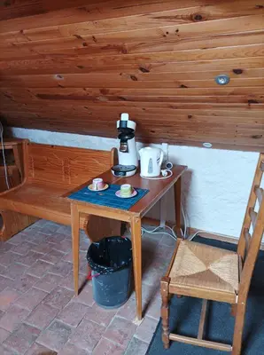 Coin salon dans l'établissement Escale du Morvan