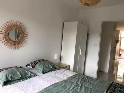 Un ou plusieurs lits dans un hébergement de l'établissement Montbard appartements au centre historique chez Delphine et Guillaume