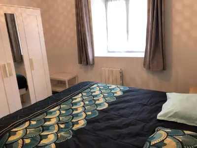 Un ou plusieurs lits dans un hébergement de l'établissement Montbard Maison 7 pers centre historique chez Delphine et Guillaume