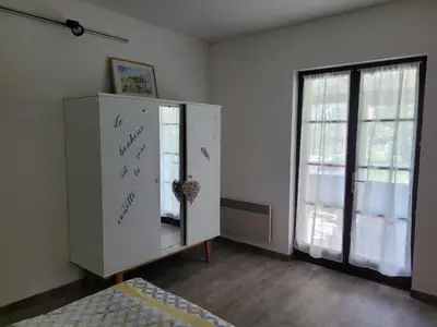 Un ou plusieurs lits dans un hébergement de l'établissement LA PETITE MAISON