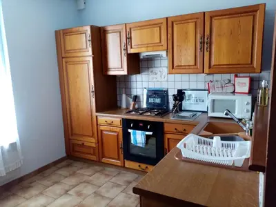 Cuisine ou kitchenette dans l'établissement LA PETITE MAISON