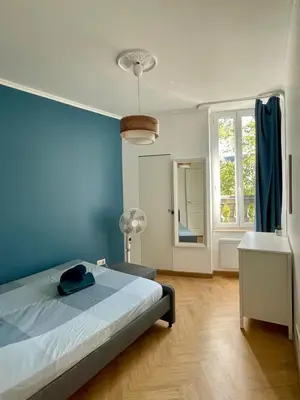 Un ou plusieurs lits dans un hébergement de l'établissement LE CLOS DE SAINT JO - Dijon centre T3