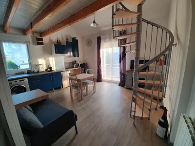 Coin salon dans l'établissement Nuits & Jours Duplex à Nuits Saint Georges