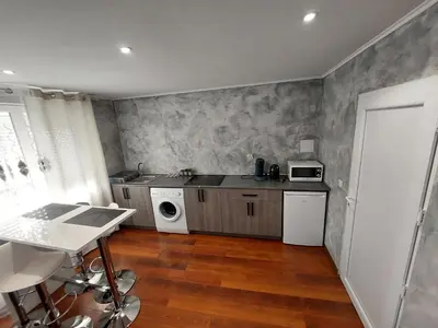 Cuisine ou kitchenette dans l'établissement Famille House 101