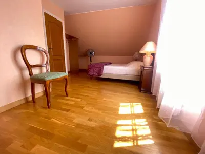 Un ou plusieurs lits dans un hébergement de l'établissement Maison familiale dans village viticole