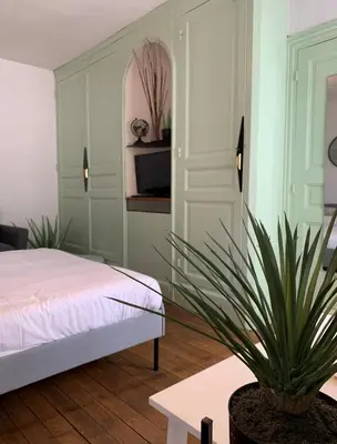 Un ou plusieurs lits dans un hébergement de l'établissement Brit Hotel Dijon Centre Gare