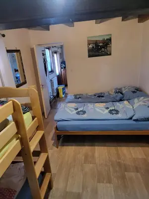 Un ou plusieurs lits dans un hébergement de l'établissement Monis Cottage in der Natur