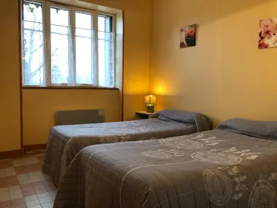 Un ou plusieurs lits dans un hébergement de l'établissement Gîte du Morvan