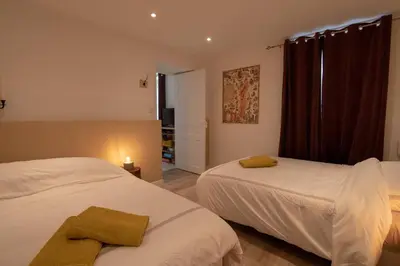 Un ou plusieurs lits dans un hébergement de l'établissement CABANA & Rustique - Proche Mâcon Nord