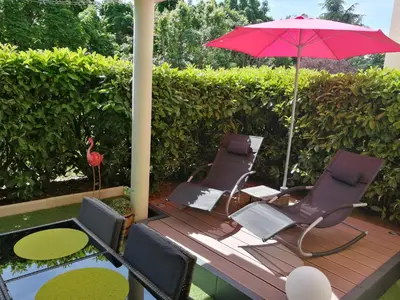 Jardin de l'établissement Romantisme et glamour 2 avec spa , clim et jardin