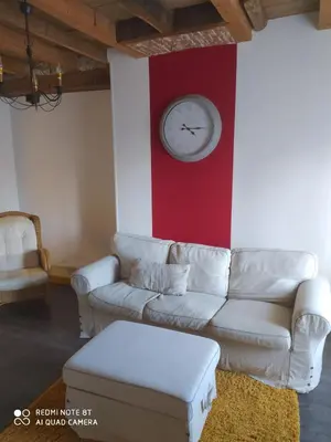 Coin salon dans l'établissement Appartement Hibou