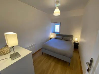 Un ou plusieurs lits dans un hébergement de l'établissement Un cocon en plein coeur du Jura