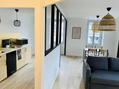 Cuisine ou kitchenette dans l'établissement Suite 24 Appart'hôtel-L'Annexe-3 étoiles